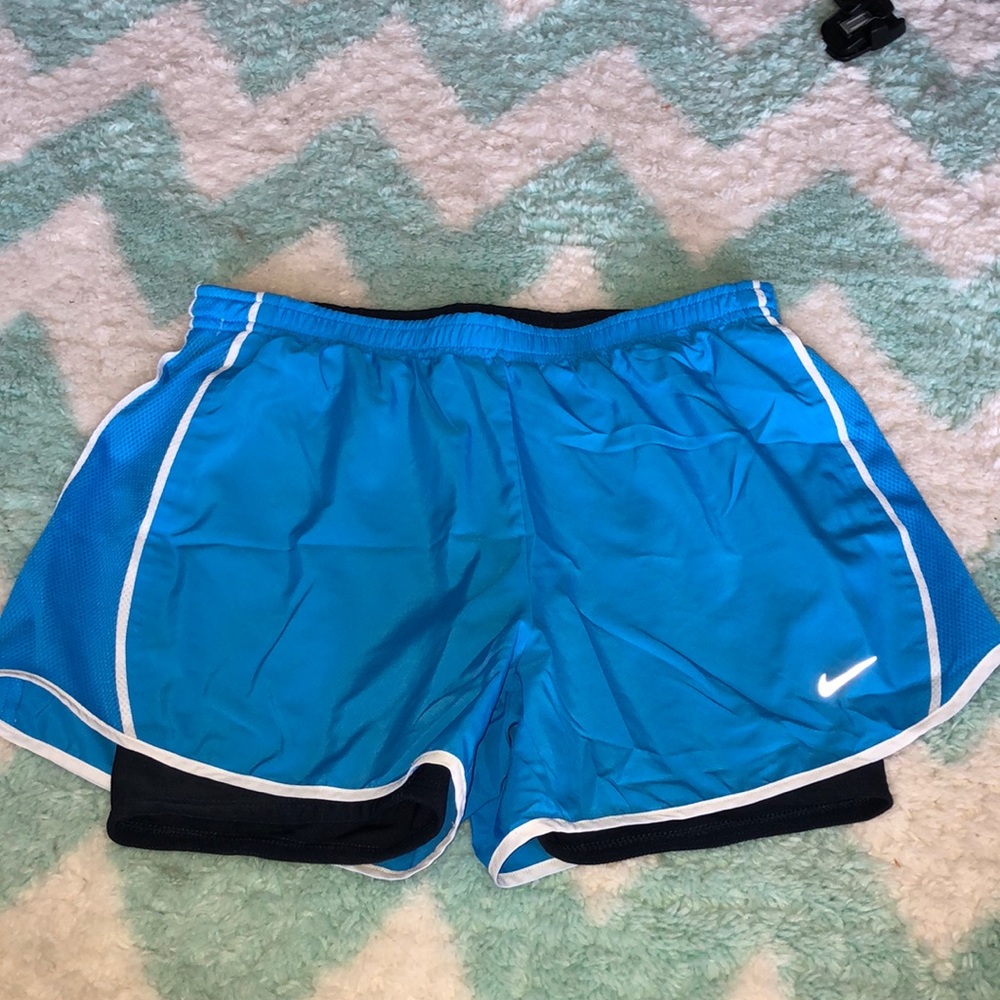 light blue nike dry fit running shorts